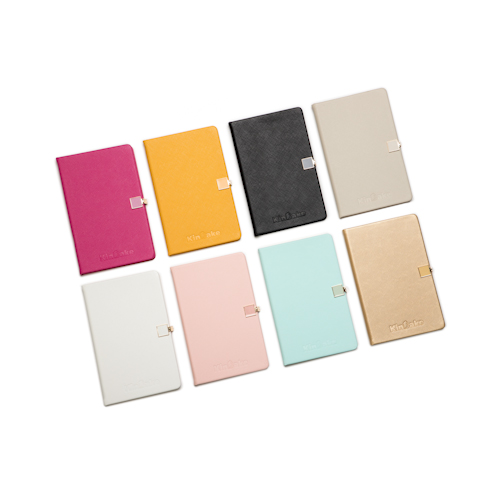 Journal notebooks with button in different colors